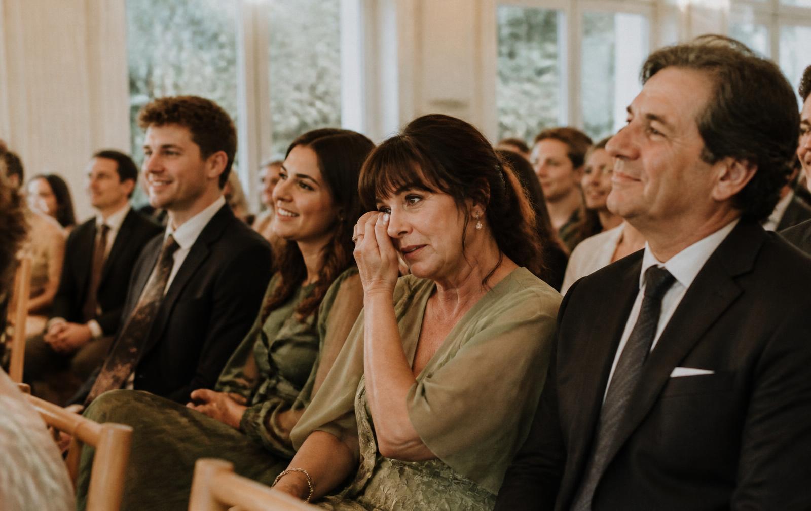 Guests listening closely during a ceremony